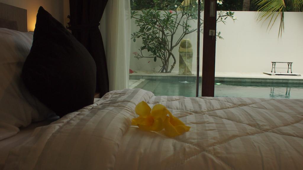 Pasific Beach Cottages Mangsit Oda fotoğraf